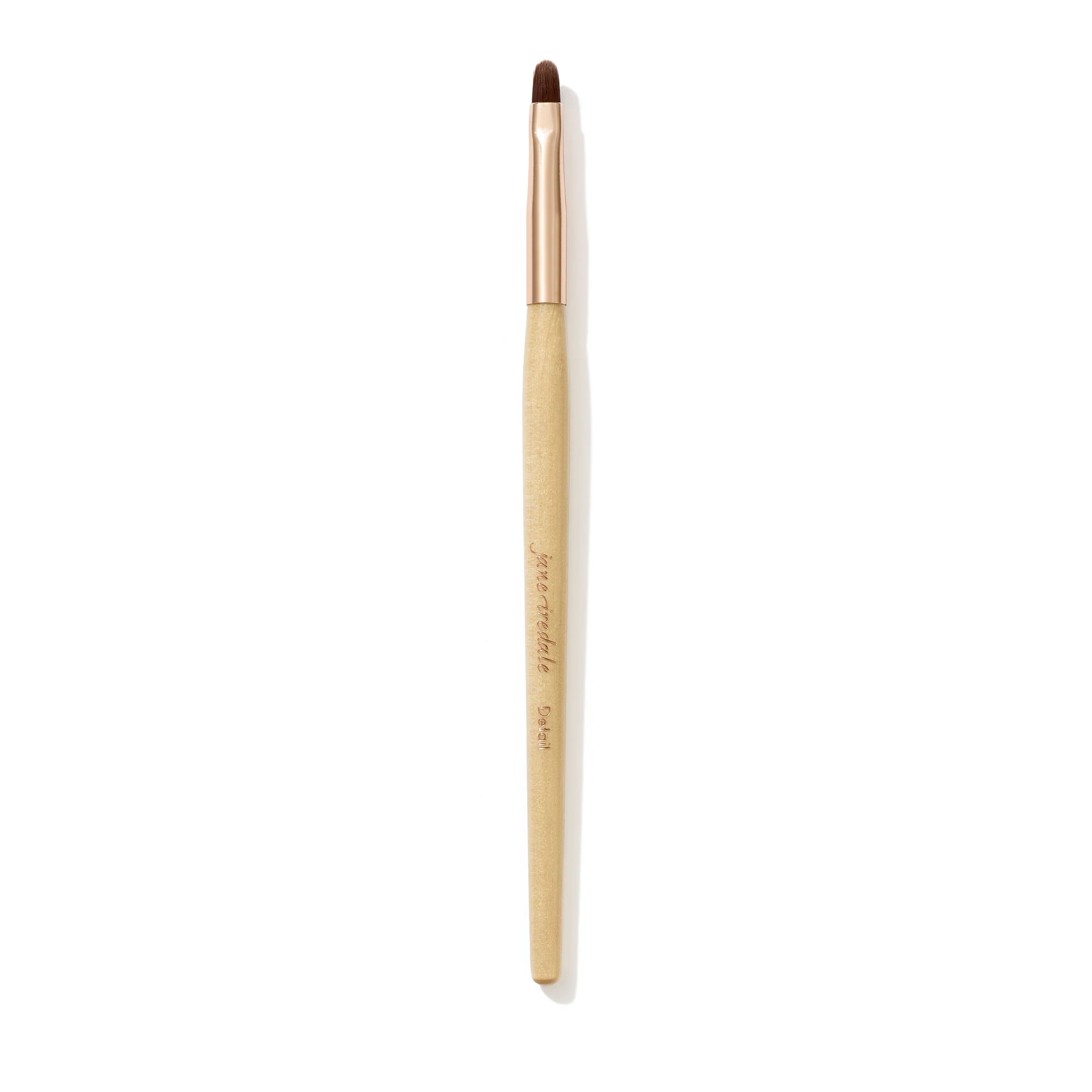 Jane Iredale Detail Brush with a small, rounded brush head and wooden handle